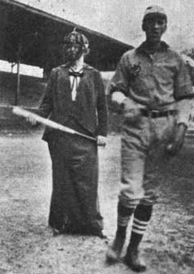 Jessamine Whitney (right) was invited to be an umpire in a 1914 charity baseball game. Standing next to her is player Pat Witherbee. (via The Survey: Social, Charitable, Civic: A Journal Of Constructive Philanthropy, Vol. 32)